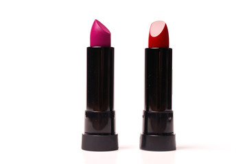 Obraz premium Lipstick of different colors isolated on white background