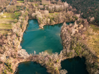 Fototapeta na wymiar aerial shot from the drone,ponds in the green. Laghetti delle Noghere , Muggia Italy 
