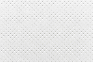 White artificial leather texture with geometric embossing for background and design.