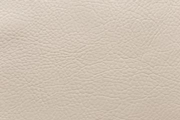 Cream artificial leather with pronounced embossed.