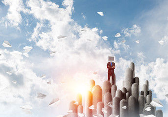 Businessman with monitor instead of head.