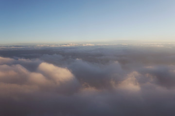 clouds at sunset from iljuminatora plane sky Sun travel