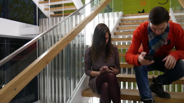 Activity is rewritten in social networks. Young people are sitting in smartphones at their free time