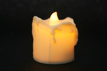 THE FLAME ON THE CANDLE