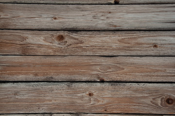 Fototapeta premium Holzwand eines alten Bauernhauses als Hintergrund