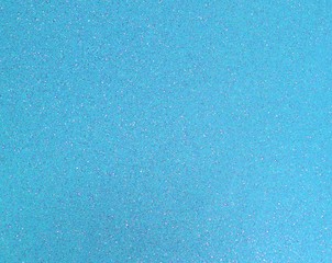 light blue background with many glittering glitter effect