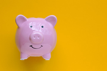 piggy bank concept isolated on yellow background