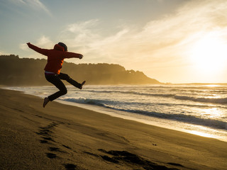 Man jumping on the beach