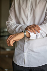 portrait of good-looking young man entrepeneur working in house