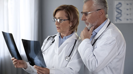 Doctors concerned about x-rays of joints result, discussing methods of treatment