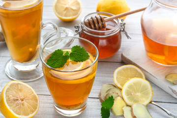 Cup of ginger tea with honey and lemon.