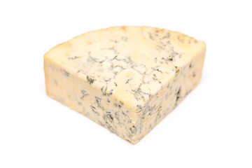 Mature blue stilton cheese isolated on a white studio background.