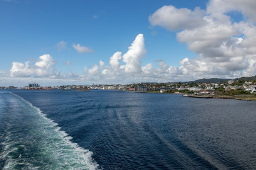 Fototapeta na wymiar Wake after a ship outside the city of Haugesund in western Norway.