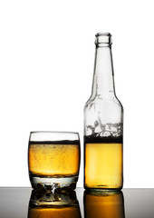 bottle of beer with a beer mug