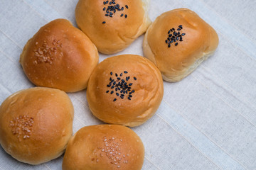 Sesame bun on table
