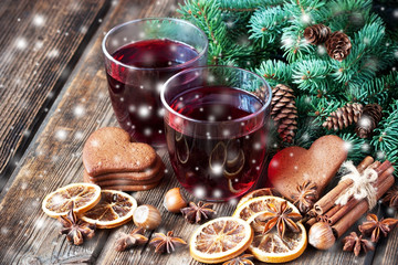 Christmas hot drink in glass and gingerbread cookies