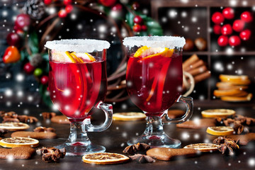 Mulled wine with slice of orange and spices