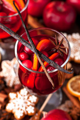 Mulled wine with slice of orange and spices