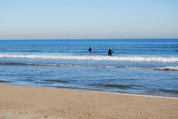 Fototapeta na wymiar Surfing in Valencia, Spain