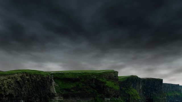 Dark rain clouds timelapse over the Cliffs of Moher, Ireland.