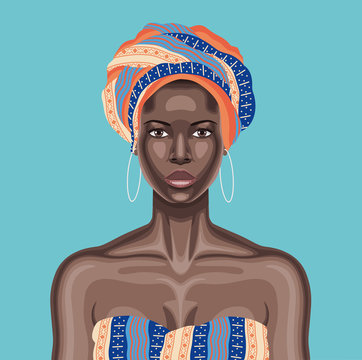Young beautiful black woman with multicolor head wrap and white hoop earrings