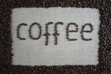 Border of coffee beans, inside the inscription "coffee"
