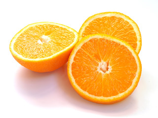 Cut oranges on a white background