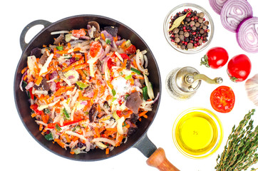 Frozen vegetables in apan, spices for cooking