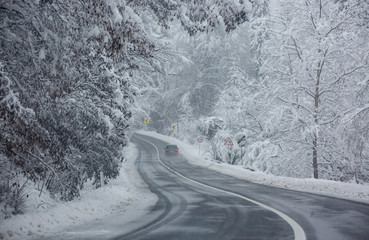 snow covered winter dangerous road