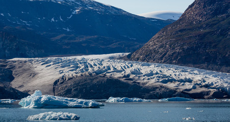 glacier closeup with icebergs in the arctic region