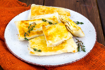 Fried pita bread with cheese