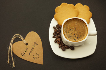 Black coffee and cookie on wooden background breakfast, top view