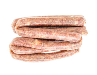 Raw homemade sausage in natural casing isolated on white background