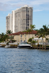  Modern Luxury Boat, Yatch at Miami Bay Side. Building on a Background. Miami, Sunny Isles..