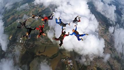 Skydivers making two circles