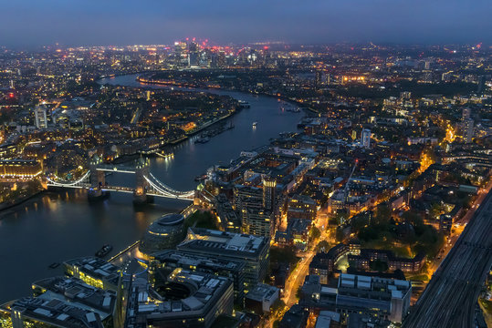 Aerial view of river Thames in London at night © mkos83