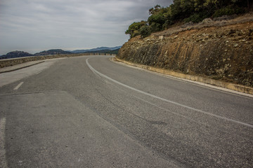 curved mountain empty car road