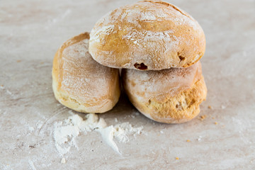 Italian bread on white marble background. Fresh homemade bread bakery