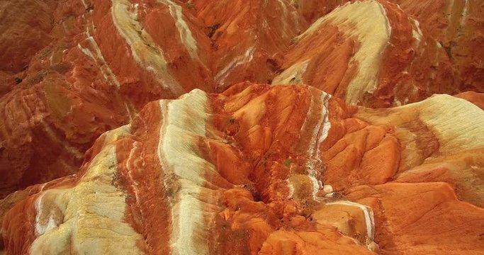 aerial view of colorful Danxia landform in Zhangye Danxia National Geological Park of China, 4k