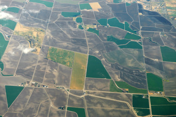 aerial view of the green field in country area 
