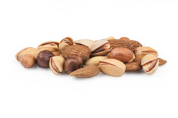 Nuts mix dried fruits isolated on white background, different kind of nut, healthy food on wooden table. hazelnut, pistachio, peanut, almond. Assorted nuts concept
