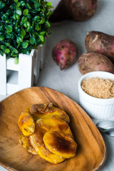 caramelized sweet potato or also known as kamotecue.  Favorite snacks of Filipino people