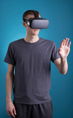 Young man using VR Virtual Reality headset