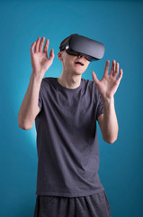 Young man using VR Virtual Reality headset