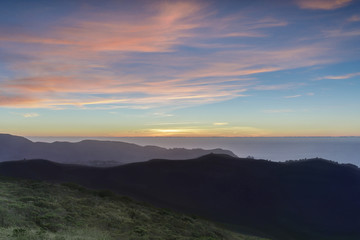 Sunset views of Sweeney Ridge top and the Pacific Ocean. Sweeney Ridge, Pacifica and San Bruno, San Mateo County, California, USA.
