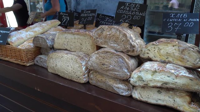 Odessa, Ukraine - 10th of June, 2017:  4K Cookery Fair in the Odessa patio - Selection of cut bread on sale at the Cookery Fair