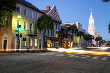 Fototapeta na wymiar Charleston, South Carolina, United States - October 30, 2018: Beautiful view of Downtown streets during a vibrant sunrise.