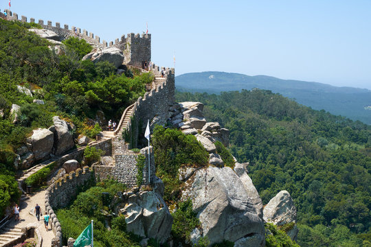 The Castle of the Moors on the top of the  rocky cliff.  Sintra. Portugal