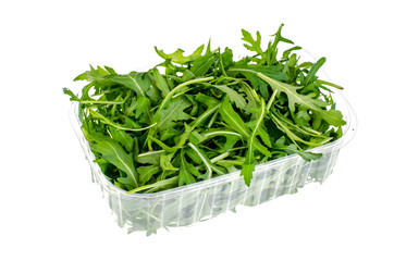 Fresh green arugula in package isolated on white background