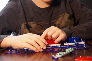 Boy playing with educational toy